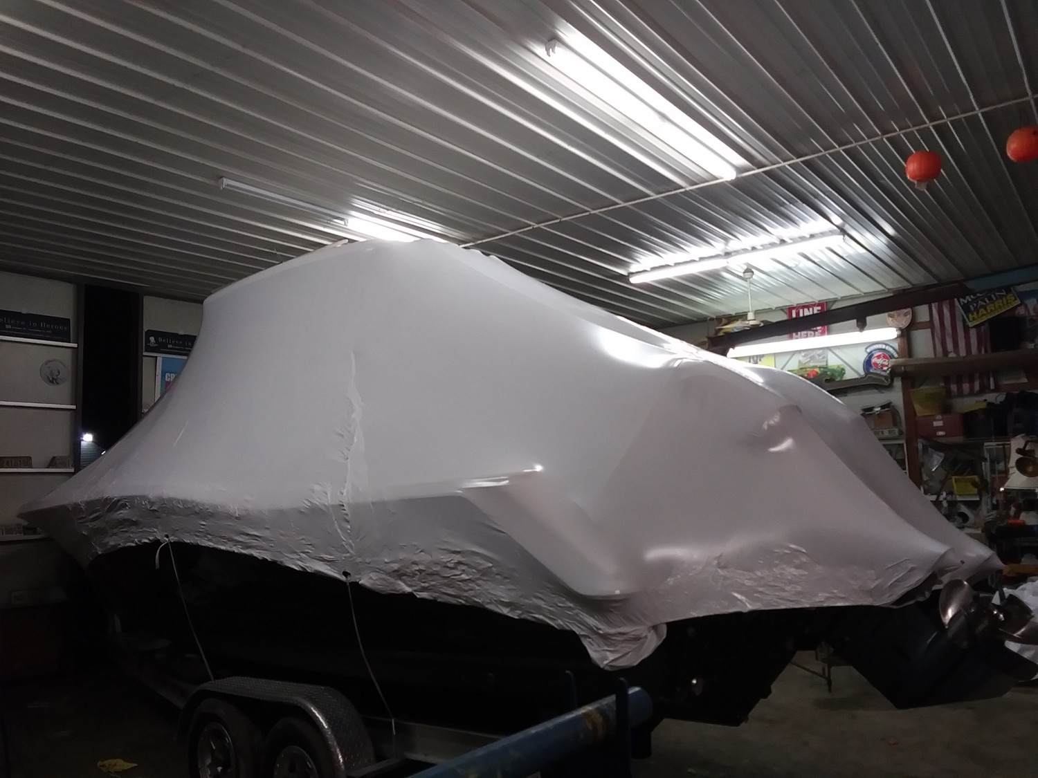 Authentic shrink-wrapped boat from the client’s work gallery
